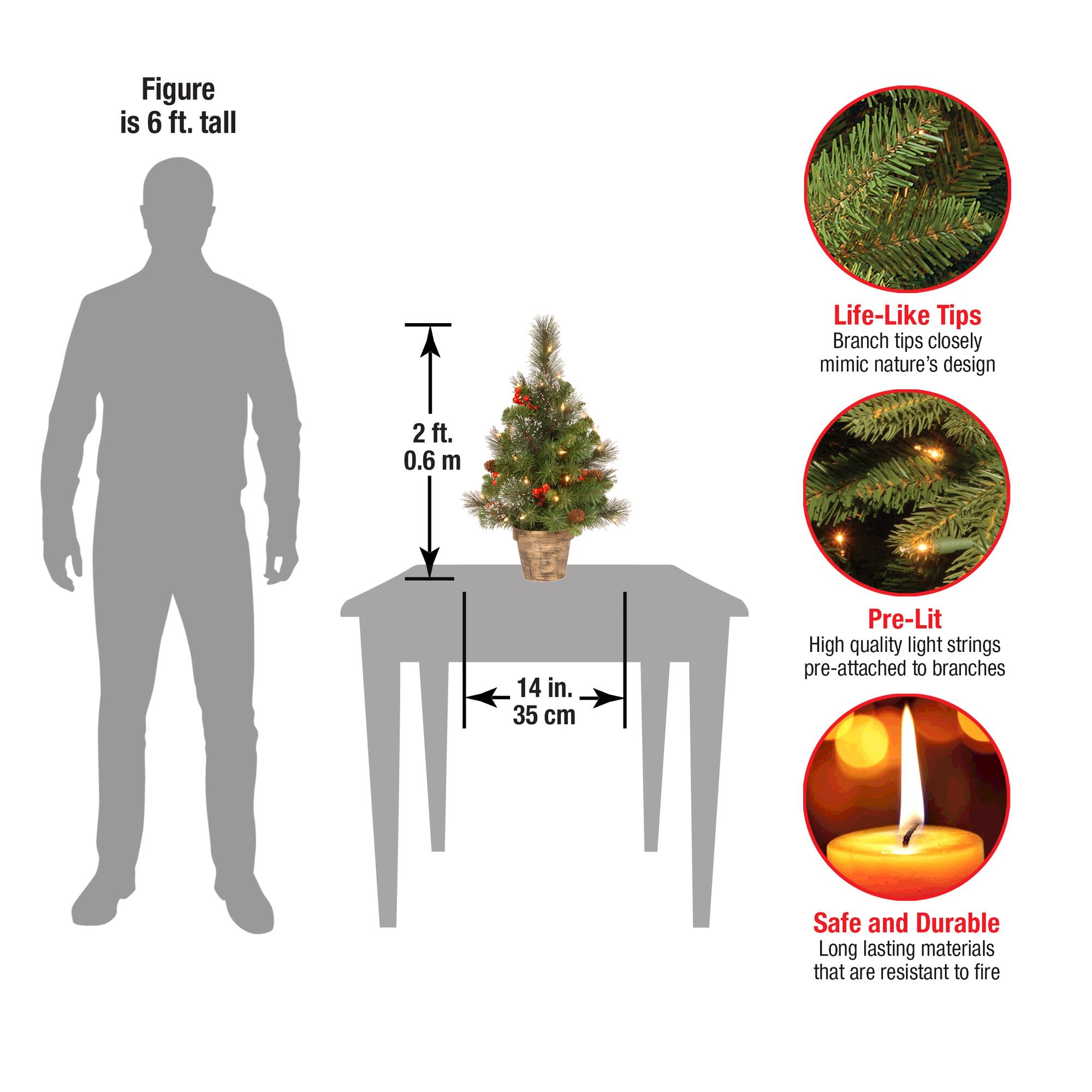 2ft. Pre-Lit Crestwood Spruce Small Tree With Silver Bristle, Cones, Red Berries & Glitter In A Plastic Bronze Pot, Clear Lights